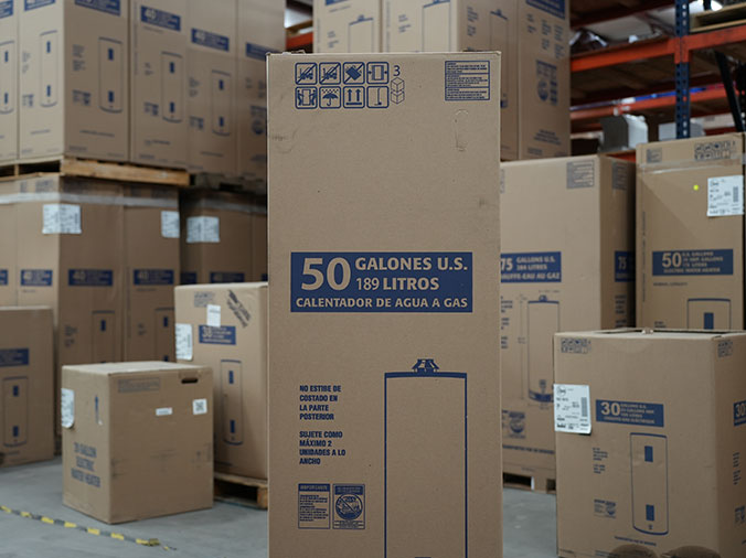 Water heaters in boxes at Hajoca Plumbing Supply Tulsa